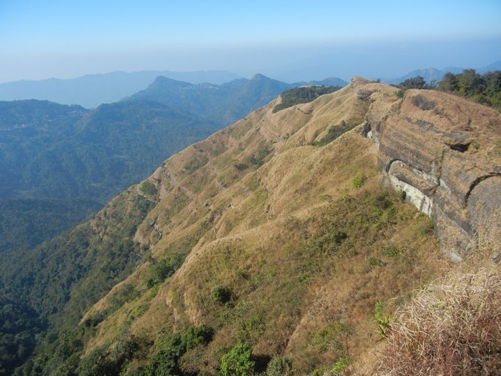 Grassy ridge and cliffs of Reiek hill in Mamit district, Mizoram